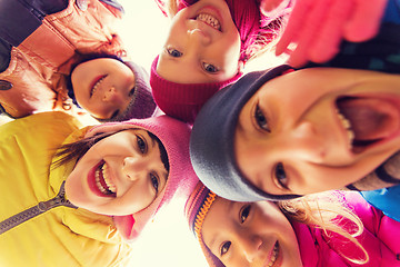 Image showing group of happy children faces in circle