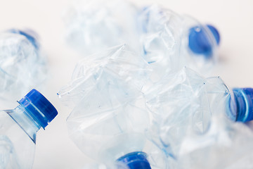 Image showing close up of empty used plastic bottles on table