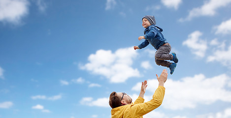 Image showing father with son playing and having fun outdoors