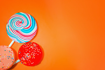 Image showing Vintage Orange Background With Colored Candy