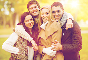 Image showing group of friends having fun in autumn park