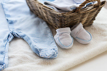 Image showing close up of baby clothes for newborn boy in basket