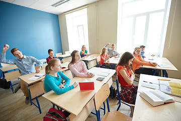 Image showing students gossiping behind classmate back at school