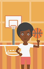 Image showing Basketball player spinning ball.