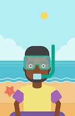 Image showing Man with snorkeling equipment on the beach.
