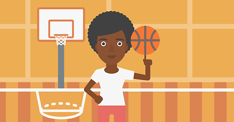 Image showing Basketball player spinning ball.