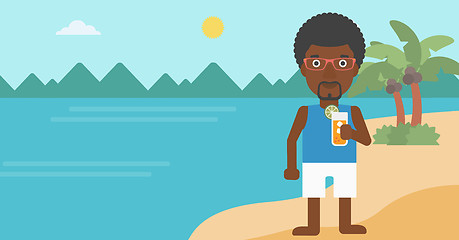 Image showing Man with cocktail on the beach.