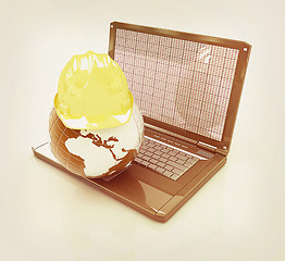 Image showing Hard hat and earth on a laptop . 3D illustration. Vintage style.