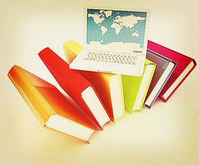 Image showing Laptop on books . 3D illustration. Vintage style.