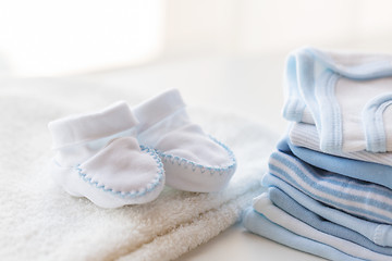 Image showing close up of baby boys clothes for newborn on table