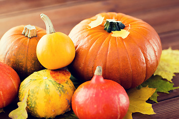 Image showing close up of pumpkins on wooden table at home