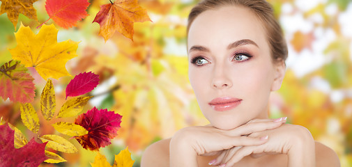 Image showing beautiful young woman face and hands