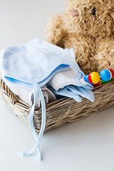 Image showing close up of baby clothes and toys for newborn