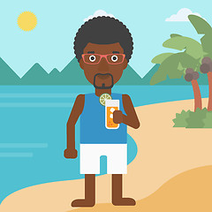 Image showing Man with cocktail on the beach.