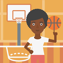 Image showing Basketball player spinning ball.