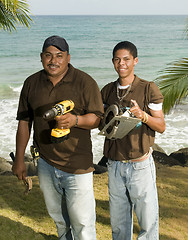 Image showing maintenance men workers  hotel resort grounds Big Corn Island Ni