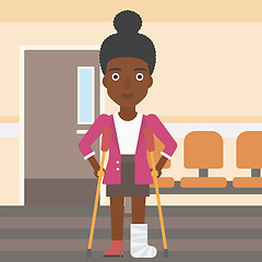 Image showing Woman with broken leg and crutches.