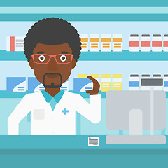 Image showing Pharmacist showing some medicine.