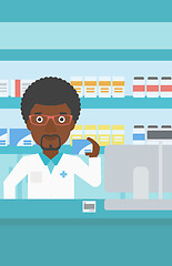 Image showing Pharmacist showing some medicine.