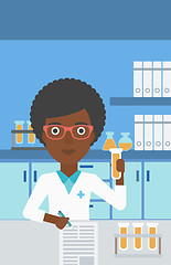 Image showing Laboratory assistant working.