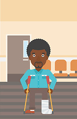 Image showing Man with broken leg and crutches.