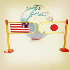 Image showing Three-dimensional image of the turnstile and flags of USA and Ja