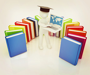 Image showing 3d man in graduation hat working at his laptop and books . 3D il