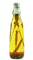 Image showing Olive Oil with Stems of Cereals