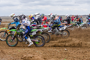 Image showing Volgograd, Russia - April 19, 2015: Motorcycle racer took the race start, at the stage of the Open Championship Motorcycle Cross Country Cup Volgograd Region Governor