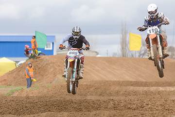 Image showing Volgograd, Russia - April 19, 2015: Two riders on the track, at the stage of the Open Championship Motorcycle Cross Country Cup Volgograd Region Governor