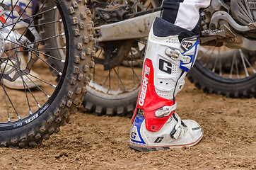 Image showing Volgograd, Russia - April 19, 2015: Racing Boot motorcycle racer at the wheel background, at the stage of the Open Championship Motorcycle Cross Country Cup Volgograd Region Governor