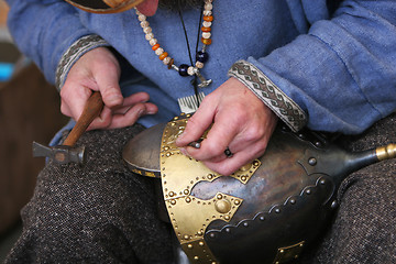 Image showing craftsmans delicate touch