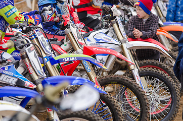 Image showing Volgograd, Russia - April 19, 2015: close-up of motorcycles at the start of the competition, at the stage of the Open Championship Motorcycle Cross Country Cup Volgograd Region Governor