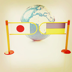 Image showing Three-dimensional image of the turnstile and flags of Japan and 