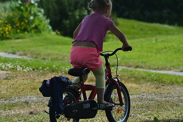 Image showing Girl on a Bicycle