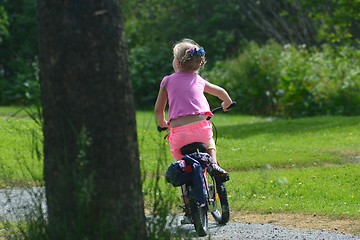 Image showing Girl on a bicycle