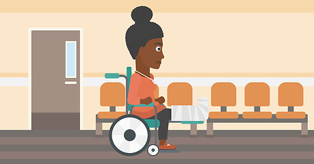 Image showing Woman with broken leg sitting in wheelchair.