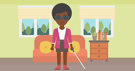 Image showing Blind woman with stick.