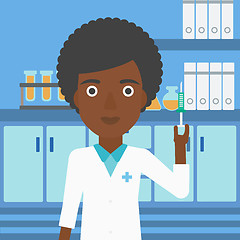 Image showing Laboratory assistant with syringe in lab.