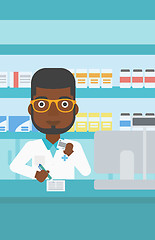 Image showing Pharmacist writing prescription.