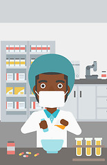 Image showing Pharmacist preparing medication.