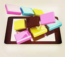 Image showing Tablet PC with colorful CMYK application icons isolated on white