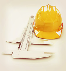 Image showing Vernier caliper and yellow hard hat 3d . 3D illustration. Vintag