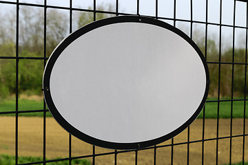 Image showing Empty board on fence