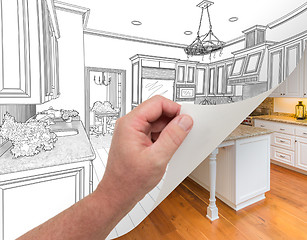 Image showing Hand Turning Page of Custom Kitchen Drawing to Photograph.