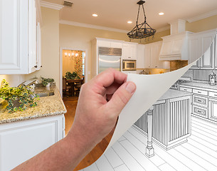 Image showing Hand Turning Page of Custom Kitchen Photograph to Drawing