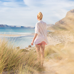 Image showing Free Happy Woman Enjoying Sun on Vacations.