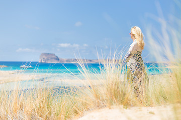 Image showing Free Happy Woman Enjoying Sun on Vacations.