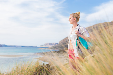 Image showing Free Happy Woman Enjoying Sun on Vacations.