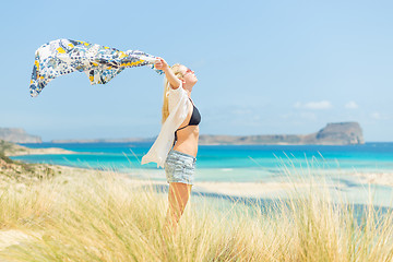 Image showing Free Happy Woman Enjoying Sun on Vacations.